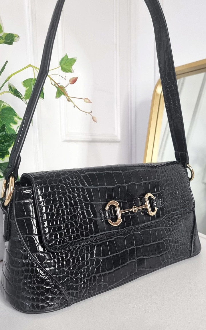 Faux Leather Croc Print Handbag with gold accents; a stylish, versatile accessory for everyday use or special occasions.