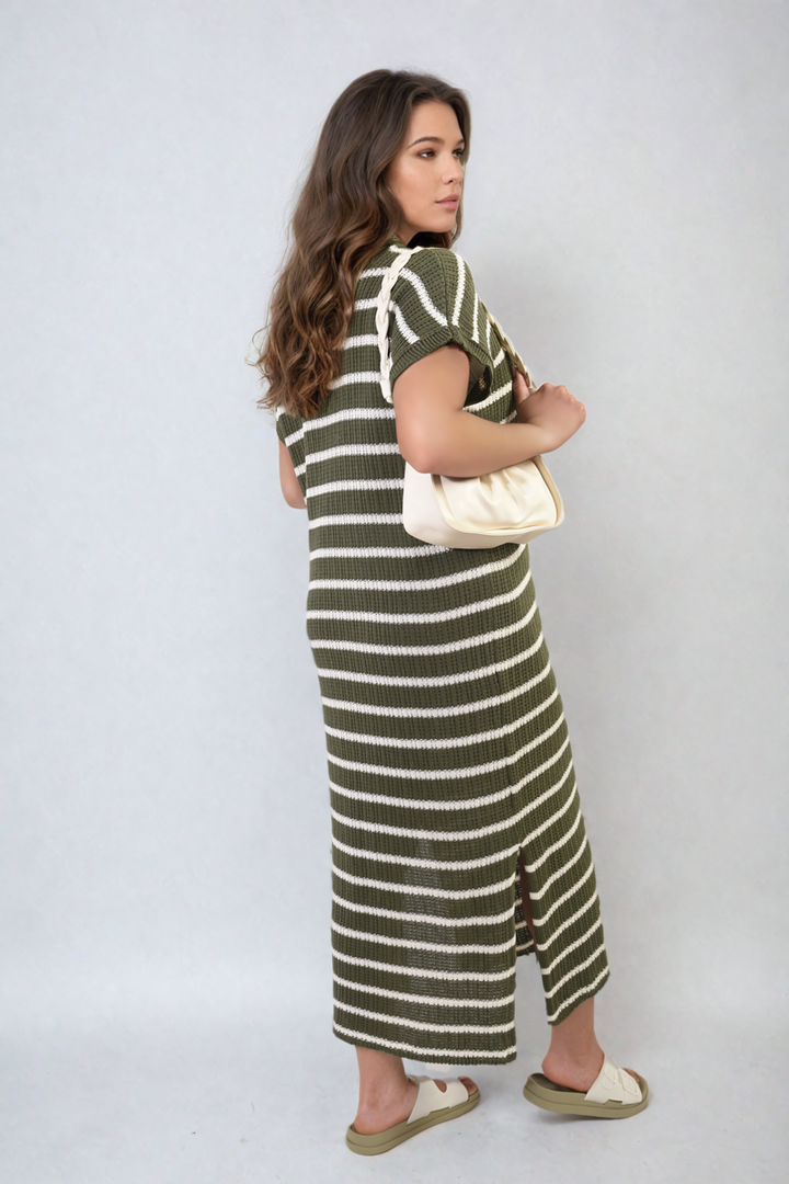 Stripe Knitted V Neck Midi Dress worn by a woman, showcasing its flattering fit and sophisticated V-neck design, perfect for versatile style and elegance.