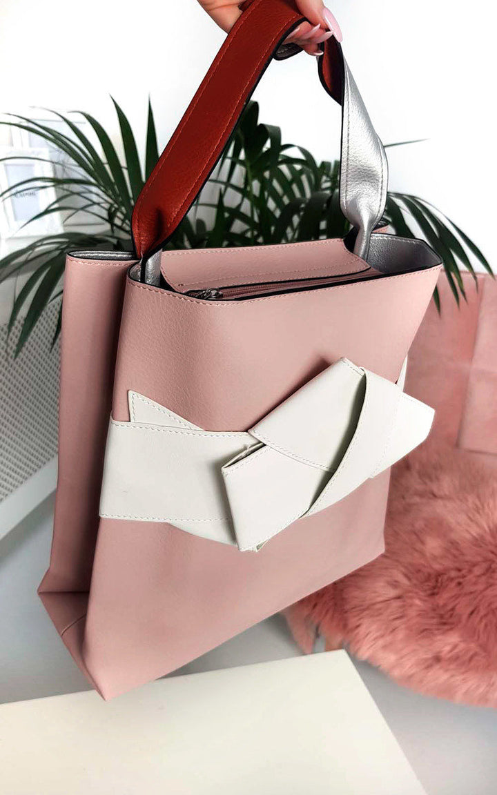 Colour Block Bow Tote Handbag featuring a pink and white design with a statement bow, faux leather texture, and handheld strap, ideal for stylish UK shoppers.