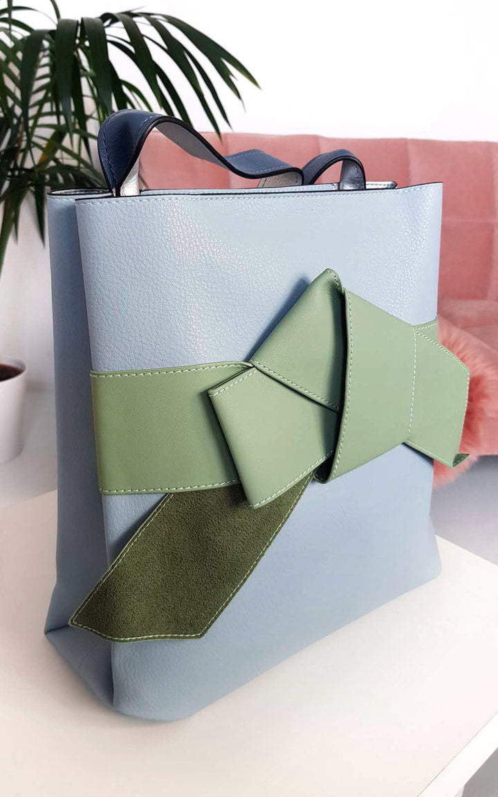 Colour Block Bow Tote Handbag featuring faux leather with a handheld strap and statement bow detail, perfect for stylish holiday outfits from Holiday Clothes UK.