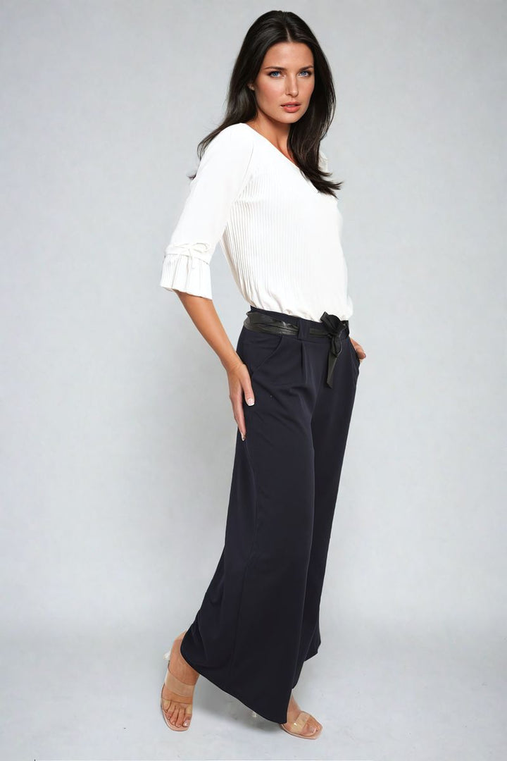 Woman modeling Mariana Belted High Waist Wide Leg Trousers, showcasing a chic silhouette with a high waist and wide leg design.