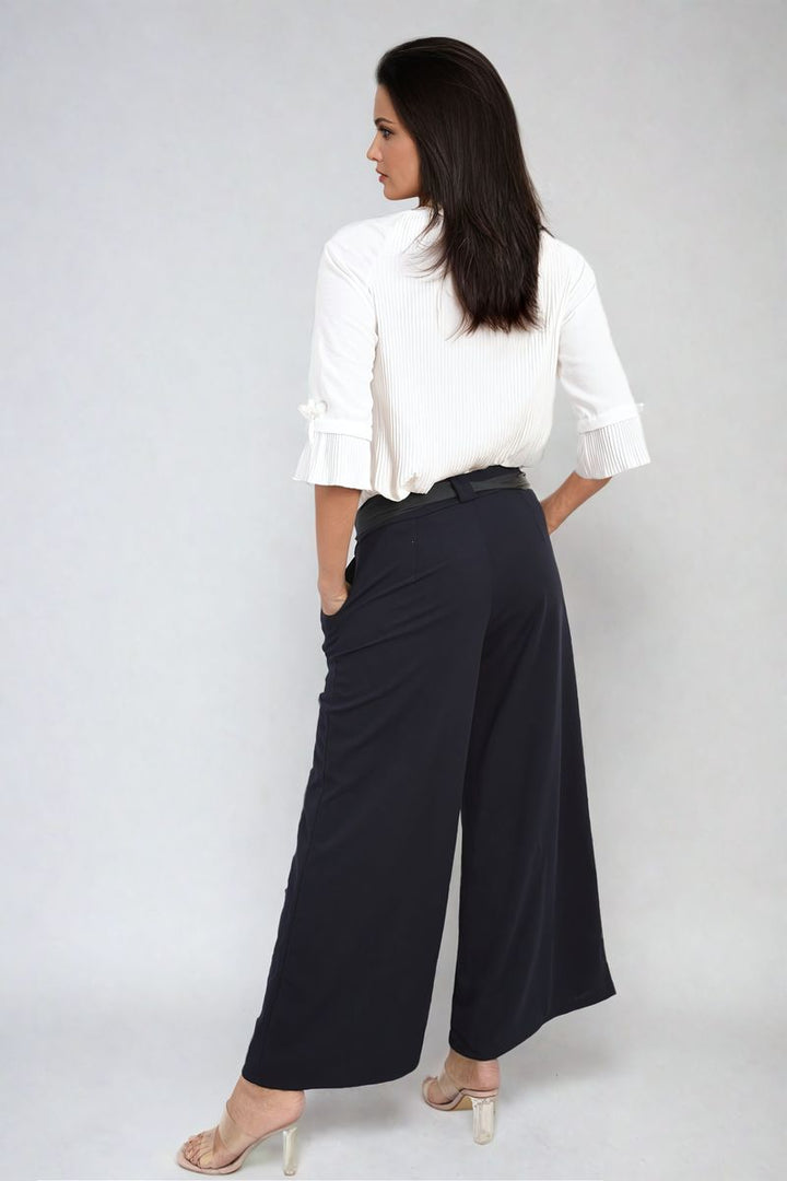 Woman wearing Belted High Waist Wide Leg Trouser, showcasing fashionable high-waist and wide-leg design from Holiday Clothes UK, highlighting stylish and versatile clothing options.