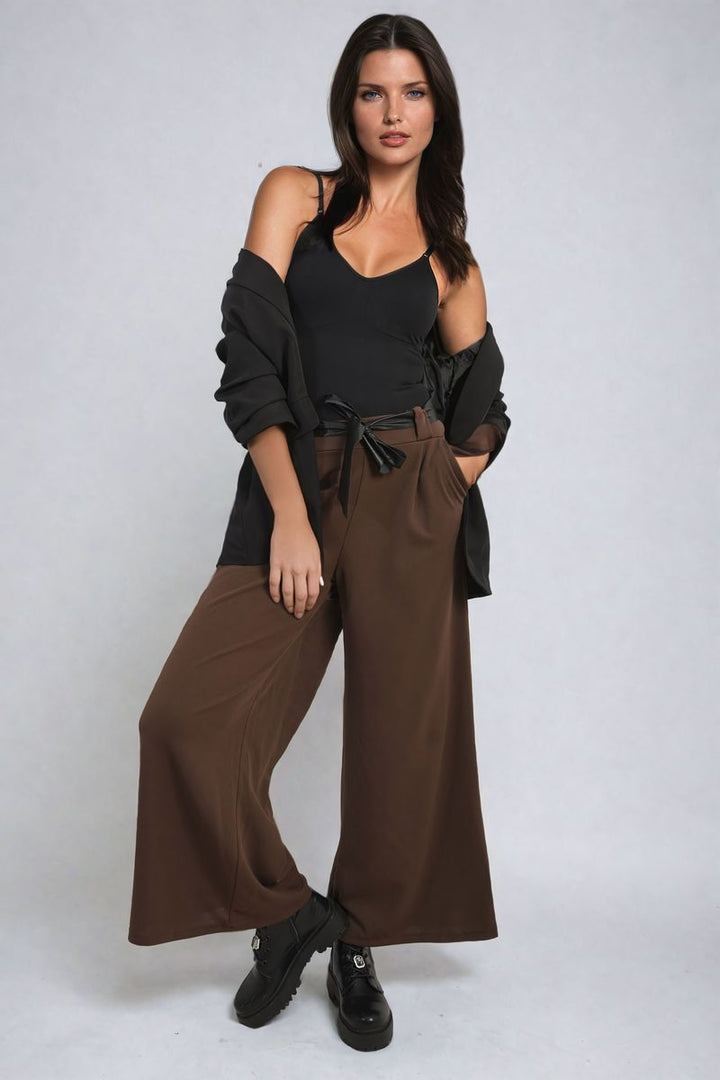 Woman wearing Belted High Waist Wide Leg Trousers with a high waist and wide leg design, perfect for chic, versatile styling.