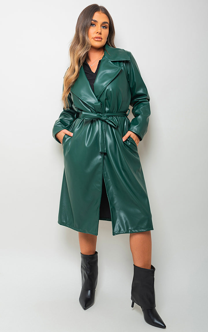 Woman wearing the Meredith Longline Belted Trench Coat, showcasing its elegant silhouette and belted waist.