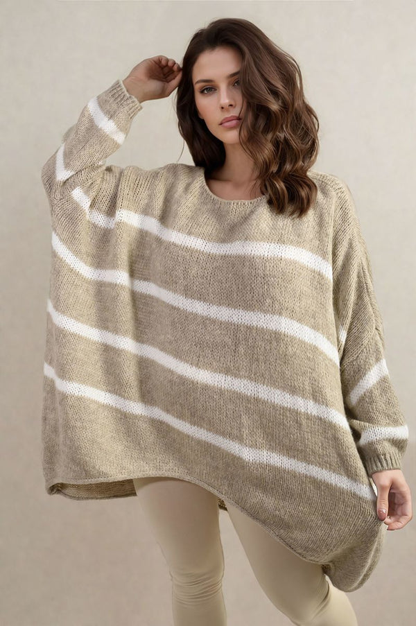 Woman modeling a Stripe Oversized Knitted Jumper with a trendy striped pattern and relaxed fit, perfect for casual, cozy looks.