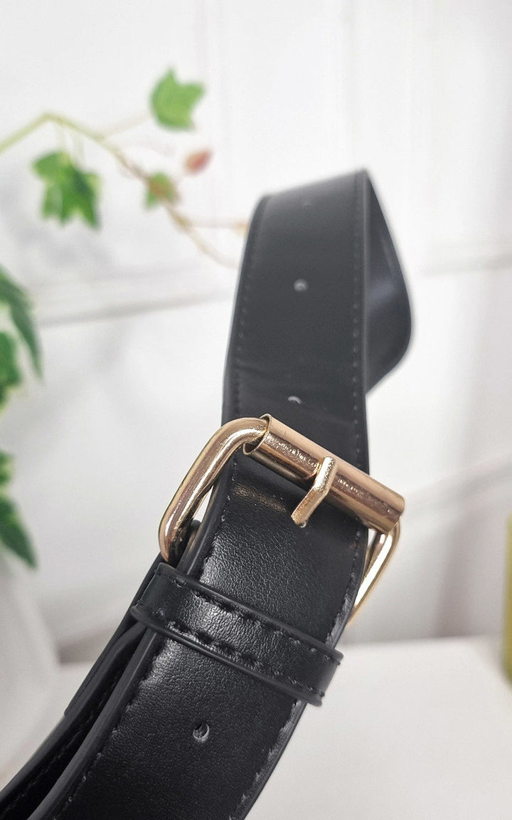 Black belt with a gold buckle, a stylish and versatile fashion accessory from Holiday Clothes UK, perfect for complementing their faux leather woven handbag collection.