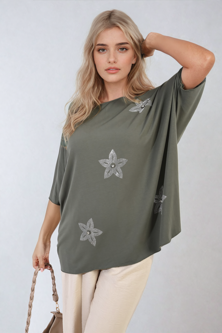 Nadia Floral Print Oversized Top showcased on a woman, highlighting its relaxed fit and vibrant floral pattern, perfect for stylish everyday wear.