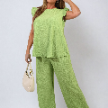 Ruffle Trim Top and Wide Leg Trouser Co-ord Set, featuring a woman in a stylish green outfit, showcasing elegant design and modern fashion.