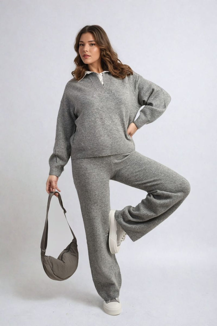 Woman wearing the Long Sleeve Knitted Collar Top and Wide Leg Pants Co-ord Set, holding a purse, showcasing stylish comfort from holiday-clothes.co.uk.