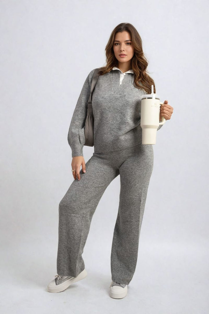 Woman in a Long Sleeve Knitted Collar Top and Wide Leg Pants Co-ord Set, holding a white cup, showcasing comfortable yet stylish casual wear.