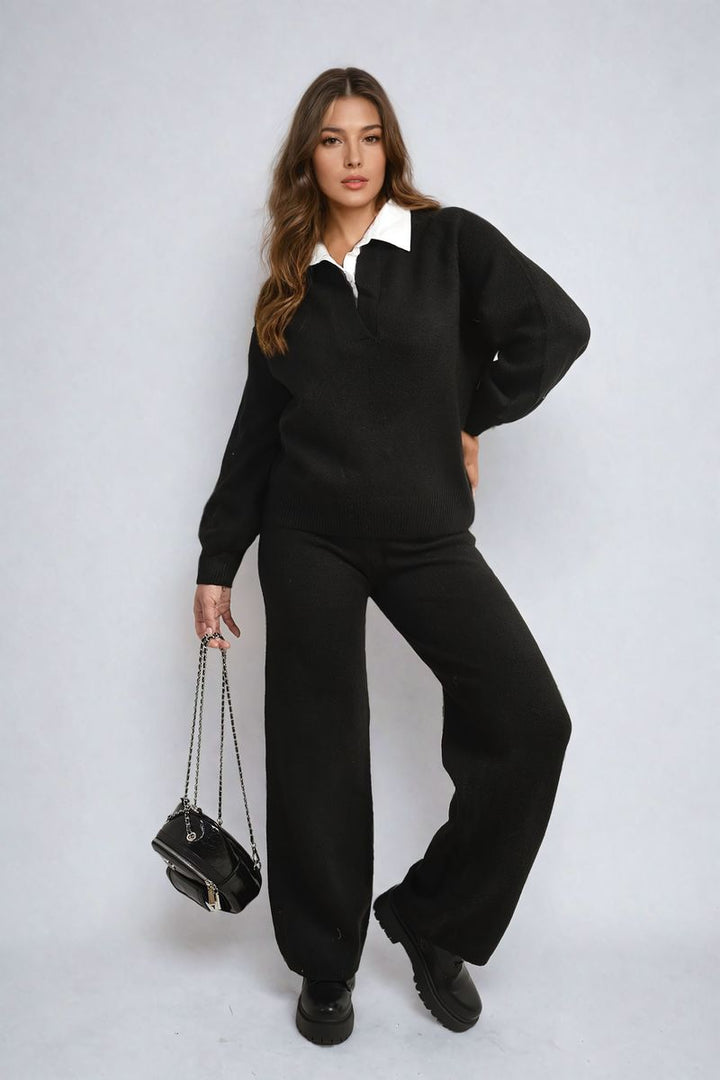 Woman in Long Sleeve Knitted Collar Top and Wide Leg Pants Co-ord Set, holding a black purse, embodying chic and comfortable style.