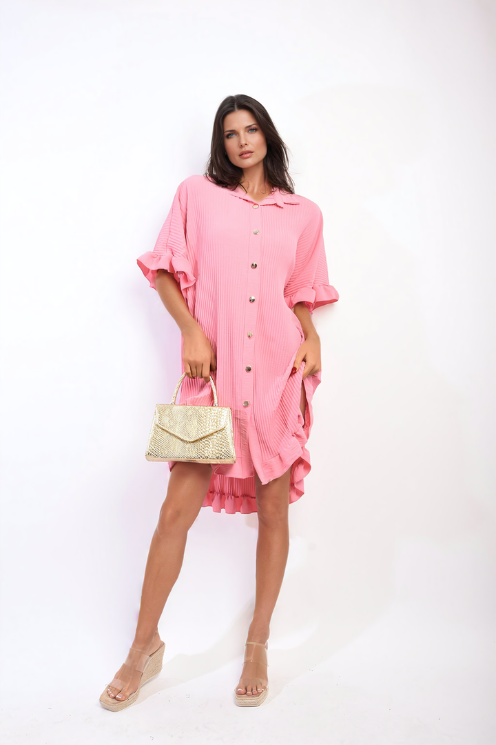 Woman wearing Button Down Oversized Ruffle Short Sleeve Mini Dress holds gold purse, showcasing fashionable outfit from Holiday Clothes UK, perfect for stylish, everyday wear.