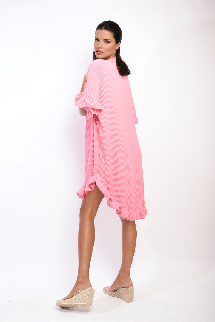 Button Down Oversized Ruffle Short Sleeve Mini Dress showcased on a model, highlighting its ruffle sleeves and button-down design, perfect for versatile styling with sandals.