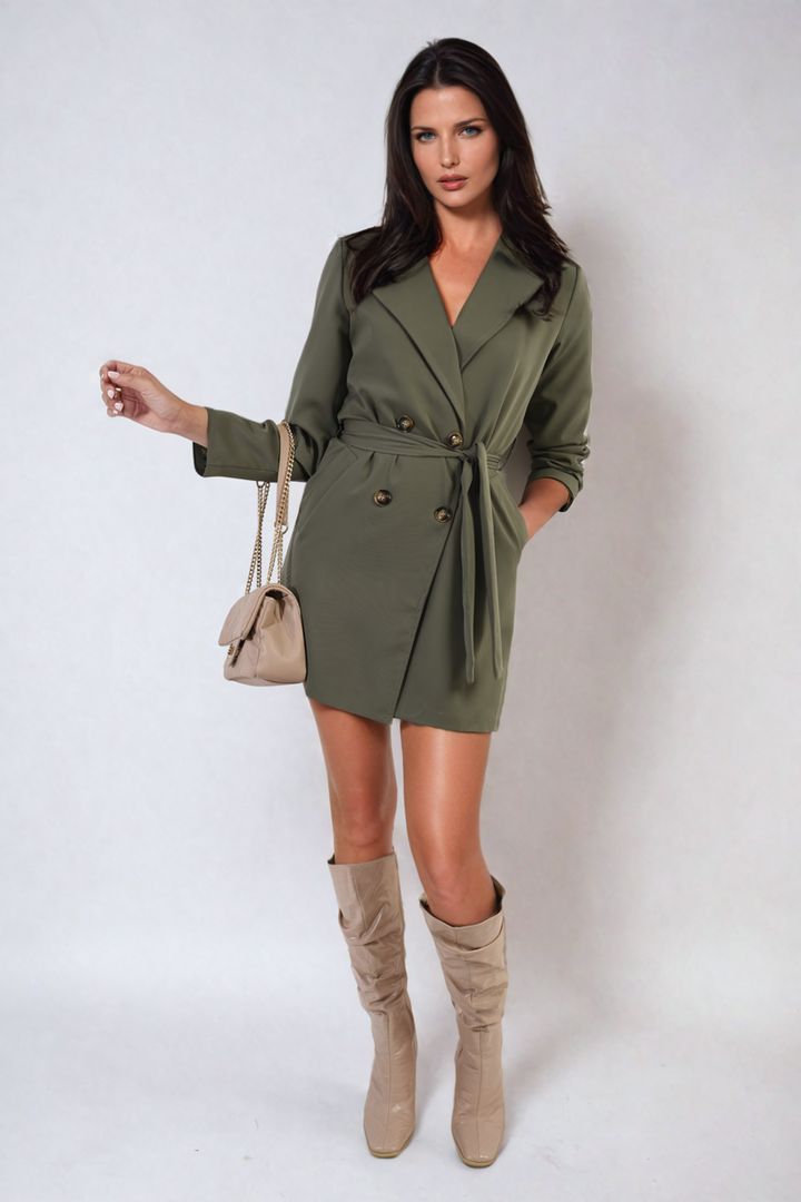 Woman modeling the Oversized Waist Tie Button Detail Blazer Jacket, highlighting its tailored fit and sophisticated style, paired with fashionable boots.