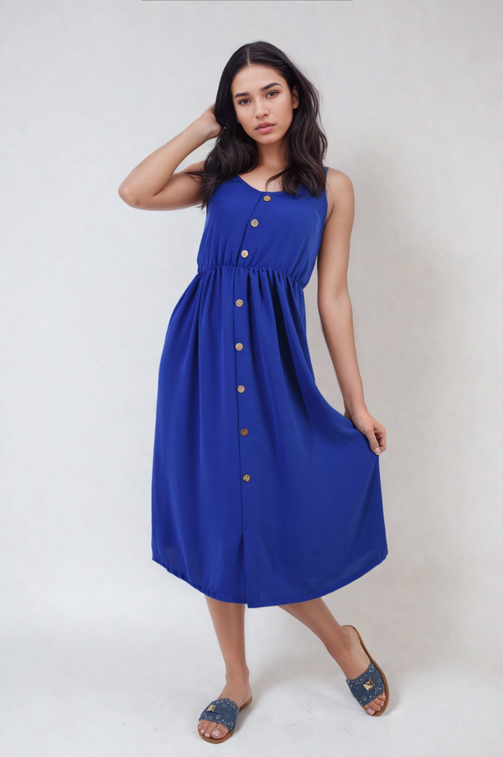 Woman wearing a Button Front Strappy Midi Dress, showcasing a chic and versatile summer look with elegant button-front and trendy strappy design.