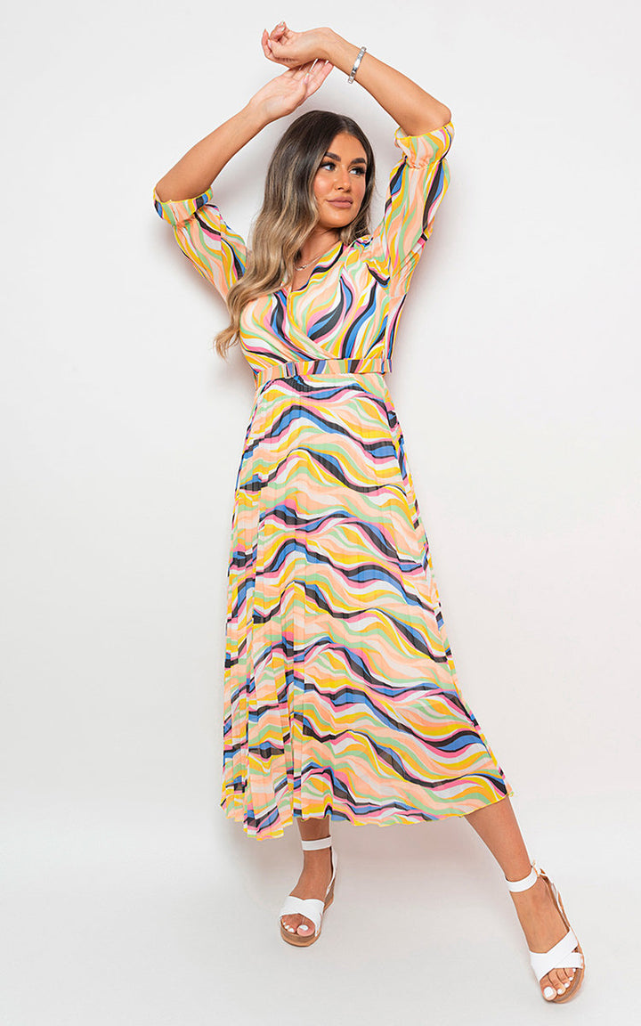 Long Sleeve Printed Maxi Dress with Belt Detail, worn by a model, featuring long sleeves and a stylish design suitable for various occasions.