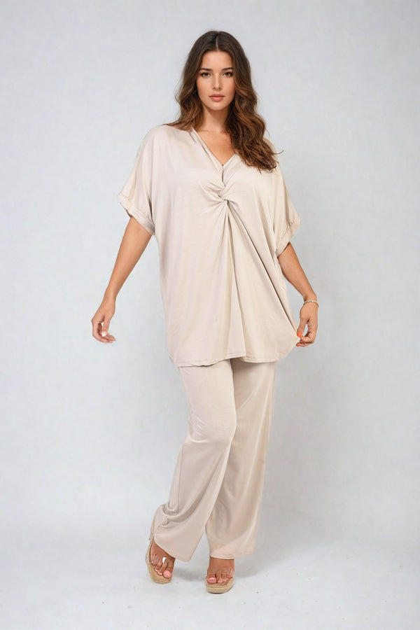 Twist Front Plunge Neckline Top and Trouser Co-ord Set, showcasing elegance with a twist front top and relaxed-fit trousers, ideal for stylish occasions.