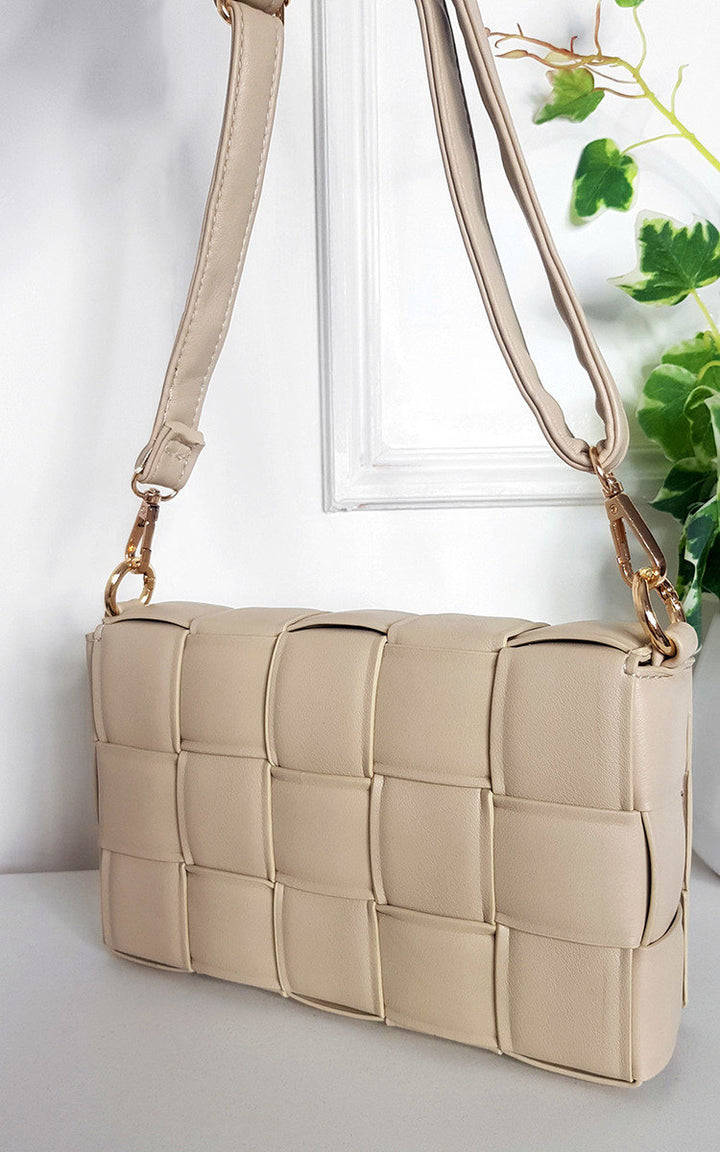 Padded Shoulder Bag with Chain Detail featuring gold handles and an adjustable strap, ideal for stylish holiday outfits and everyday essentials.