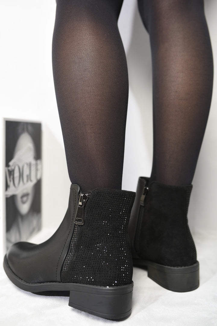 Side Zipper Chelsea Ankle Boots with sleek side zipper, worn by a model showcasing their stylish and modern design. Perfect for chic, everyday wear.