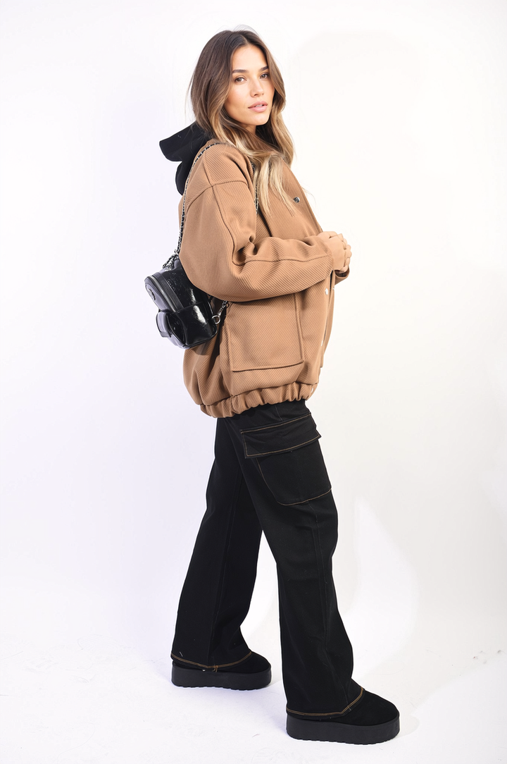 Drawstring Waist Flap Pocket Wide Leg Cargo Jeans styled with a brown jacket and black boots, showcasing a relaxed, chic look perfect for casual occasions.